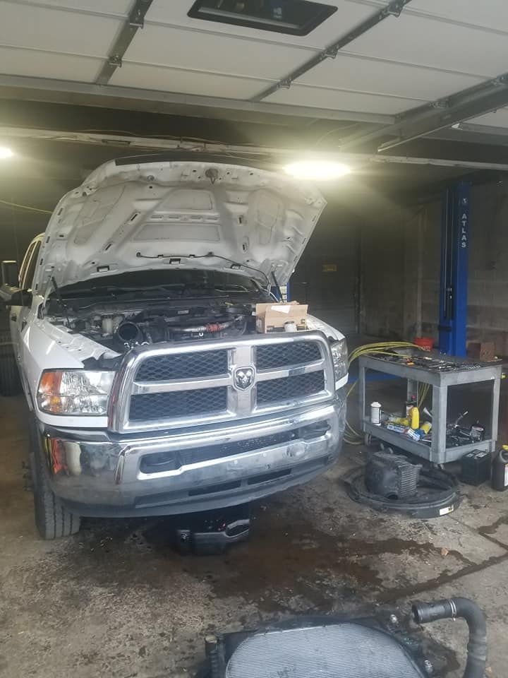 Truck being serviced with hood open